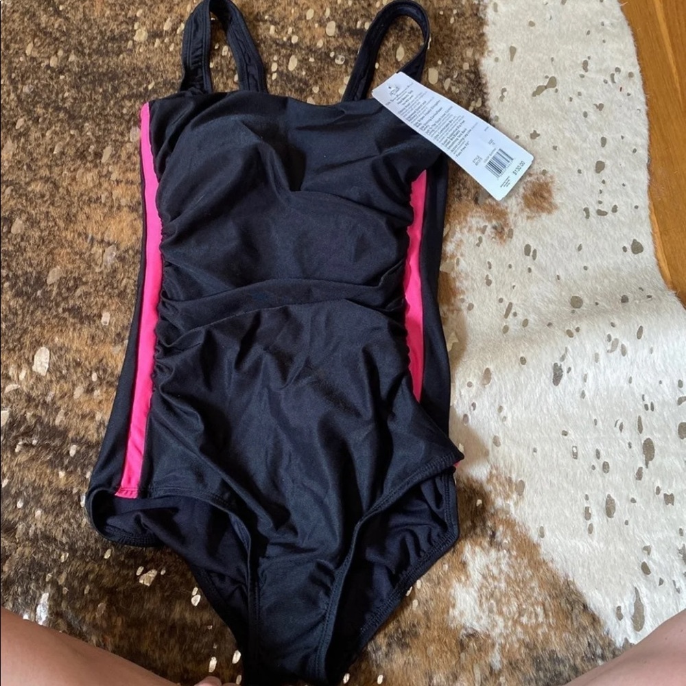 Size 8 and 10 miraclesuit new with tags